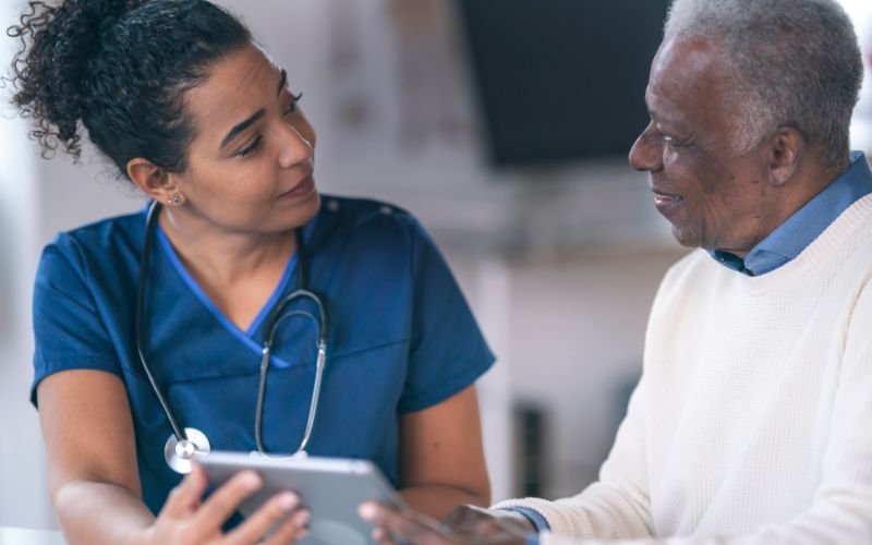 doctor talking to patient